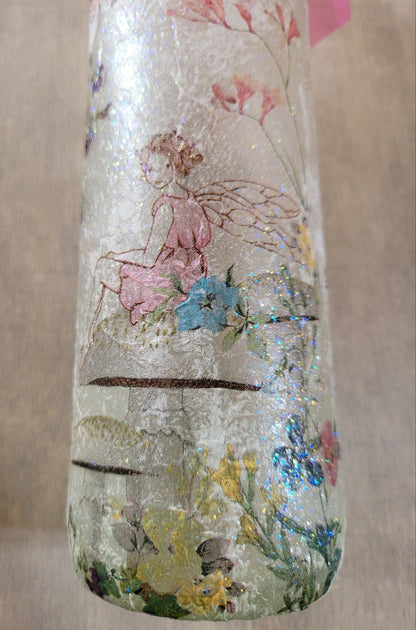 Decoupage Fairy bottle lamp - flower fairy sitting on a mushroom image, on the side of a wine bottle