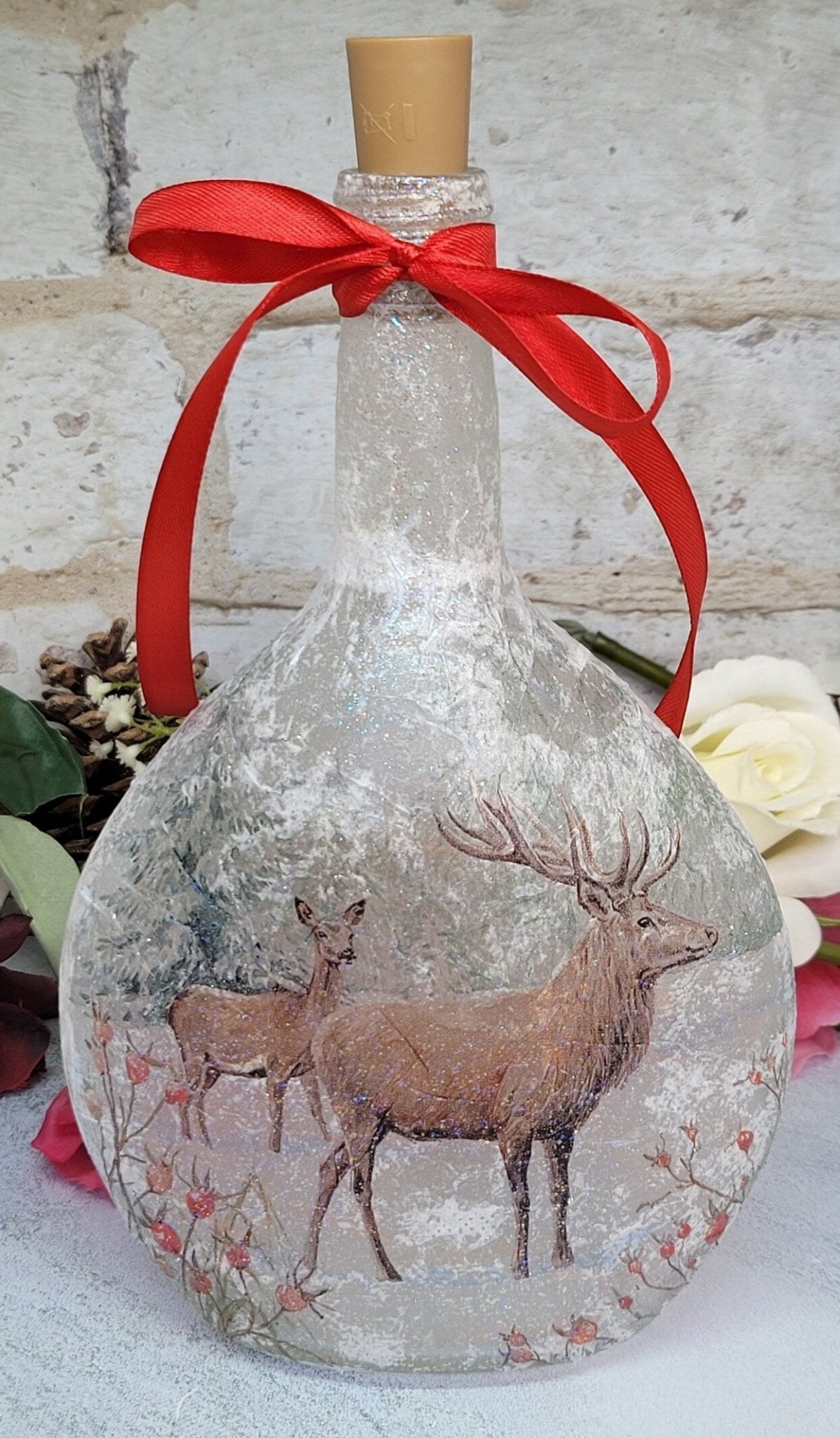 Decoupage Stag Light Up Bottle - Round glass bottle with Stag detailing. Red bow tied around the neck of the bottle, cork LED lights