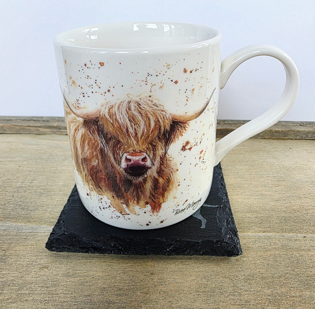 mug sitting on a black square slate coaster