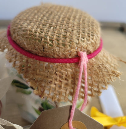 Hessian top on a jar secured with pink band