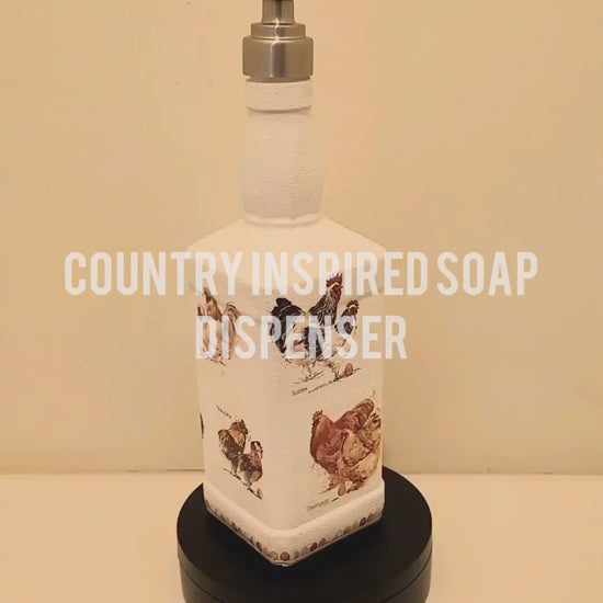 Square white painted bottle with chicken print detail. Silver pump head in the top