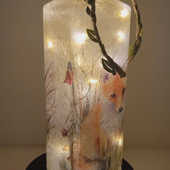 Rotating Lit up square bottle with Fox Image. Jute string with leaves