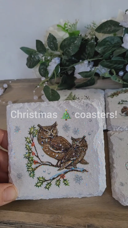 Set of four square slate coasters with four different wildlife designs; Foxes, Owls, Rabbits and Deer. All are depicted in the snow