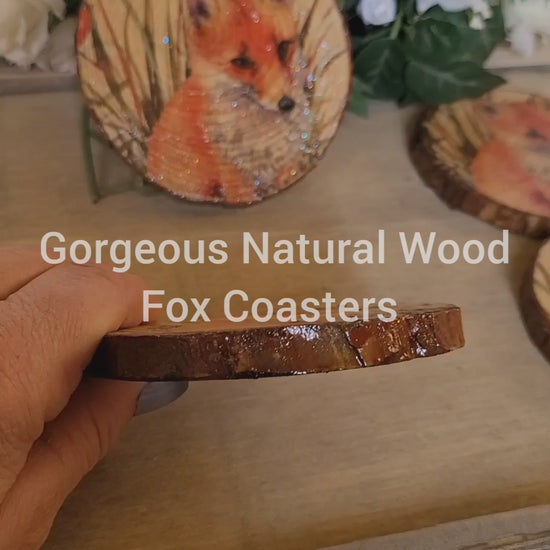 Four wood slice coasters, round with fox detail on each one. Varnished so look glossy.