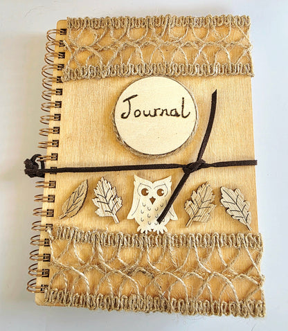 Wooden journal with decorative wooden leaves and owl elements. Burlap jute decoration top and bottom. Faux suede tie