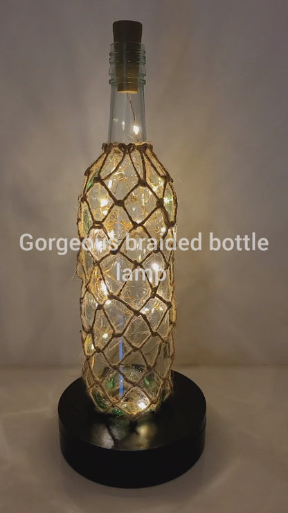 Rotating Lit up Wine bottle with braided jute string detail